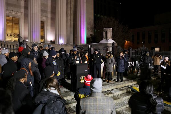 Baltimore Mayor Brandon Scott addresses attendees at the annual Vigil of Remembrance at War Memorial Plaza, Tuesday, Jan. 7, 2025, in Baltimore, Md., to honor the lives of Baltimoreans lost in 2024. (Wesley Lapointe/The Baltimore Banner via AP)