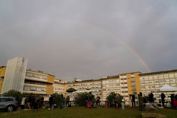 A rainbow shines over the Agostino Gemelli Polyclinic in Rome, Tuesday, Feb. 18, 2025, where Pope Francis was hospitalized Friday, Feb. 14, after a weeklong bout of bronchitis worsened and is receiving drug therapy for a respiratory tract infection. (AP Photo/Gregorio Borgia)