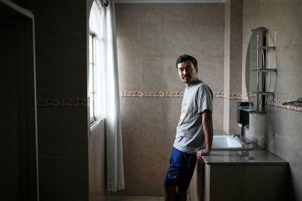 Afghan migrant Hayatullah Omagh poses for a portrait in Panama City, Monday, March 10, 2025, after being deported from the United States, detained for weeks in a Panamanian immigration camp and released on a temporary humanitarian visa allowing a 30‑day stay. (AP Photo/Matias Delacroix)