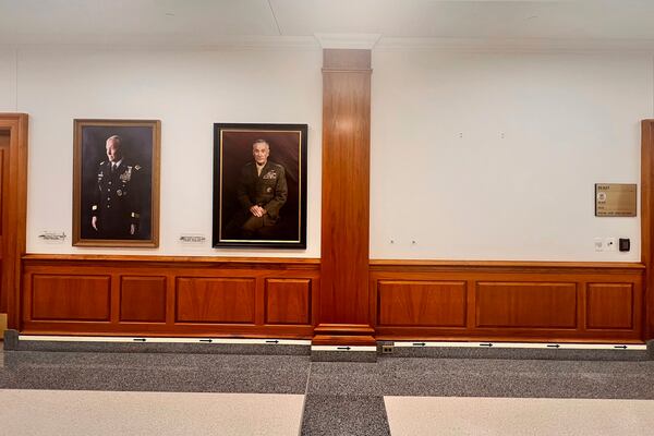 The space where a portrait of retired Gen. Mark Milley is empty at the Pentagon on Monday, Jan. 20, 2025 in Washington. (AP Photo/Tara Copp)