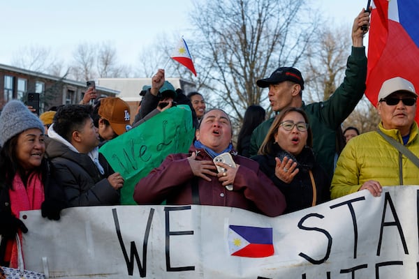 Supporters of former Philippine President Rodrigo Duterte demonstrate outside the International Criminal Court detention center near The Hague in Scheveningen, Netherlands, Wednesday, March 12, 2025. (AP Photo/Omar Havana)