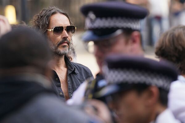Russell Brand arrives at Westminster Magistrates' court in London, Friday, May 2, 2025, where he faces, rape and sexual assault charges involving four women. (AP Photo/Alberto Pezzali)