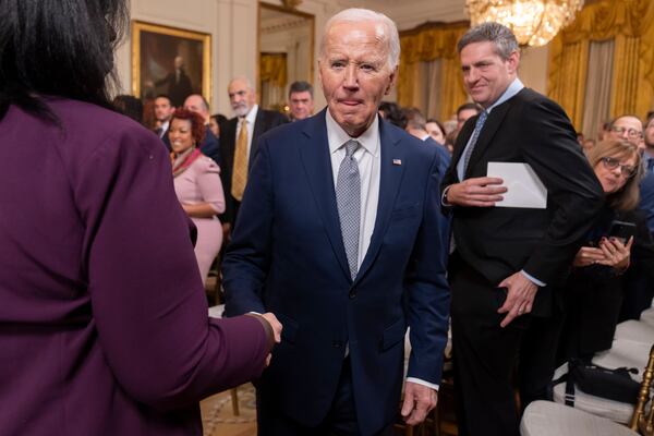 President Joe Biden listens to a reporter's question after an event to award the Presidential Citizens Medal to recipients in the East Room at the White House, Thursday, Jan. 2, 2025, in Washington. (AP Photo/Mark Schiefelbein)