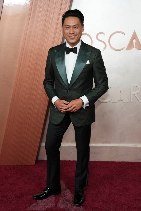 Jon M. Chu arrives at the Oscars on Sunday, March 2, 2025, at the Dolby Theatre in Los Angeles. (Photo by Jordan Strauss/Invision/AP)