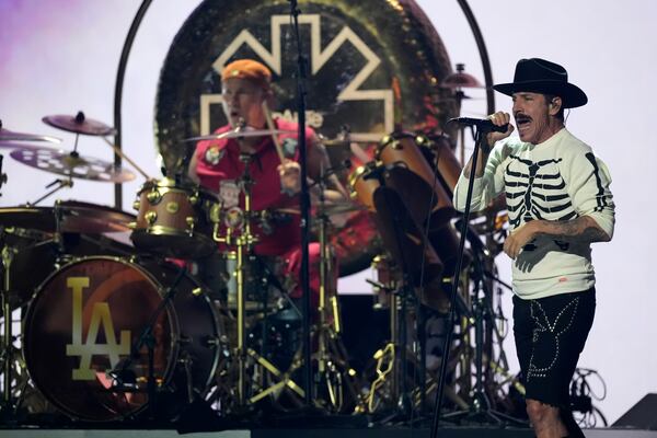 Chad Smith, left, and Anthony Kiedis of Red Hot Chili Peppers perform during the FireAid benefit concert on Thursday, Jan. 30, 2025, at The Forum in Inglewood, Calif. (AP Photo/Chris Pizzello)