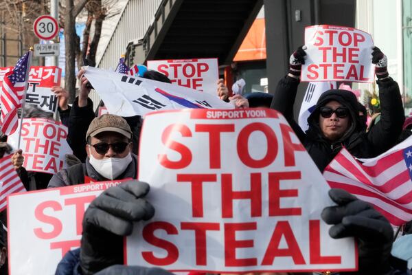 Supporters of impeached South Korean President Yoon Suk Yeol attend a rally to oppose his impeachment near the presidential residence in Seoul, South Korea, Tuesday, Jan. 7, 2025. (AP Photo/Ahn Young-joon)