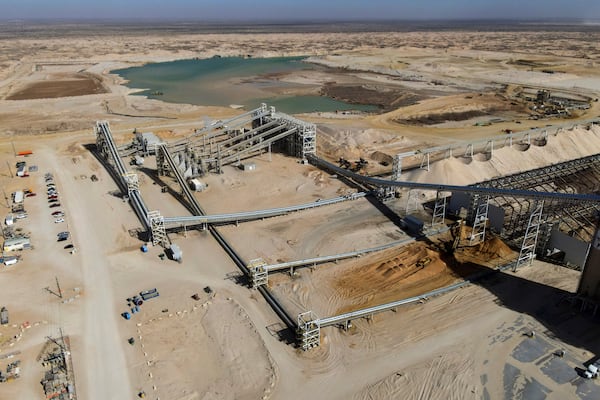 A general view shows Atlas Energy, at the beginning of a 42-mile conveyor belt that carries sand needed for hydraulic fracturing Wednesday, Feb. 26, 2025, in Kermit, Texas. (AP Photo/Julio Cortez)