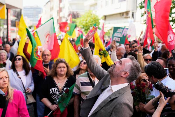 Socialist Party secretary general Pedro Nuno Santos waves to supporters during an election campaign action in Moscavide, on the outskirts of Lisbon, Friday, May 16, 2025, ahead of the May 18 general election. (AP Photo/Armando Franca)