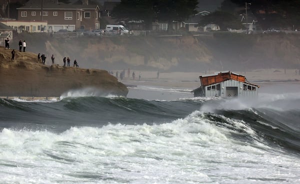 A building floats in the ocean after a wharf partially collapsed Monday, Dec. 23, 2024, in Santa Cruz, Calif. (Shmuel Thaler/The Santa Cruz Sentinel via AP)