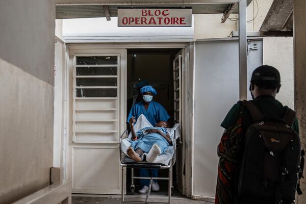 A person wounded in the fighting between M23 rebels and Congolese armed forces arrives at the Cbeca Ndosho hospital in Goma, Democratic Republic of the Congo, Thursday, Jan. 23, 2025. (AP Photo/Moses Sawasawa)