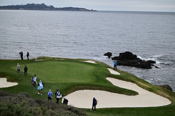 Jordan Spieth, far left, leads his group to the seventh green at Pebble Beach Golf Links during the second round of the AT&T Pebble Beach Pro-Am golf tournament, Friday, Jan. 31, 2025, in Pebble Beach, Calif. (AP Photo/Nic Coury)