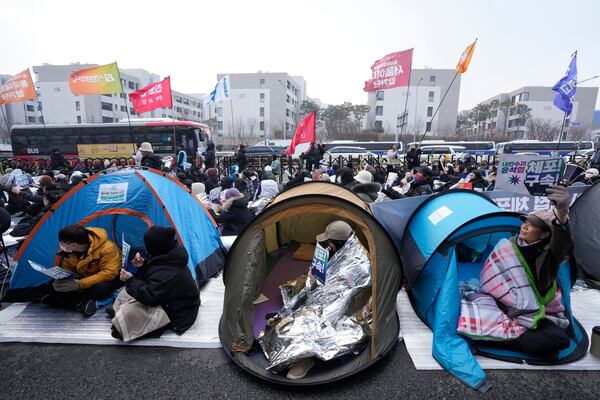 Protesters demanding the arrest of impeached South Korean President Yoon Suk Yeol attend a rally near the presidential residence in Seoul, South Korea, Monday, Jan. 6, 2025. (AP Photo/Ahn Young-joon)