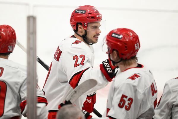 Carolina Hurricanes center Logan Stankoven (22) celebrates his goal in the third period of Game 1 of a second-round NHL hockey playoff series against the Washington Capitals Tuesday, May 6, 2025, in Washington. (AP Photo/Nick Wass)