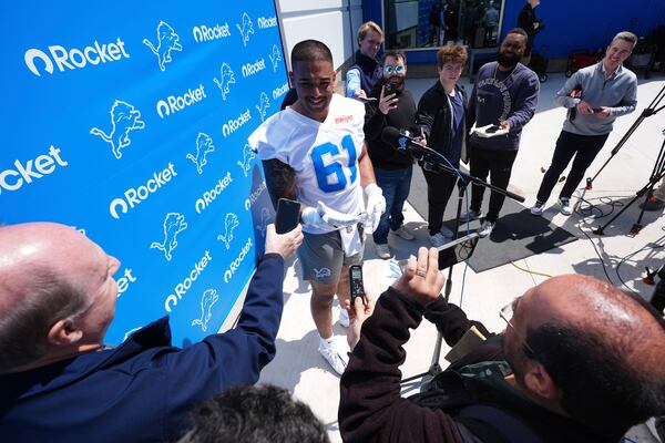 Detroit Lions defensive lineman Ahmed Hassanein (61) speaks with the media after the NFL football team's rookie minicamp in Allen Park, Mich., Friday, May 9, 2025. (AP Photo/Paul Sancya)