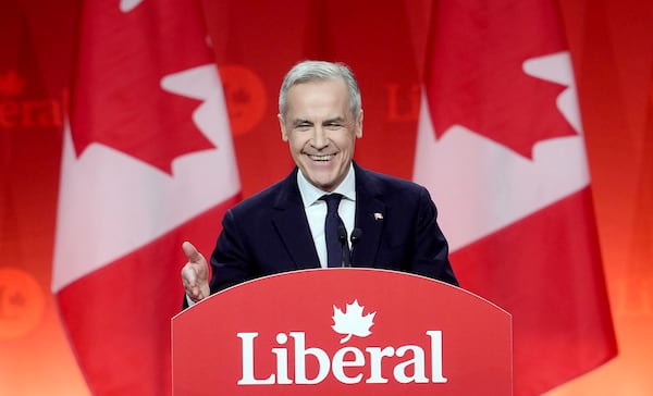 Liberal Leader Mark Carney smiles as he delivers his victory speech during the Liberal leadership announcement in Ottawa, Ontario, Sunday, March 9, 2025. (Adrian Wyld/The Canadian Press via AP)