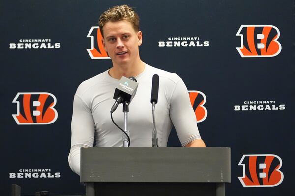 FILE - Cincinnati Bengals quarterback Joe Burrow talks during a news conference after an NFL football game against the Dallas Cowboys, in Arlington, Texas, Dec. 9, 2024. (AP Photo/Julio Cortez, File)