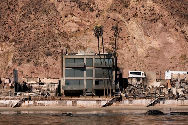 FILE - Damage to beachfront homes by the Palisades Fire is visible along the coastline, Jan. 15, 2025, in Malibu, Calif. (AP Photo/Carolyn Kaster, File)