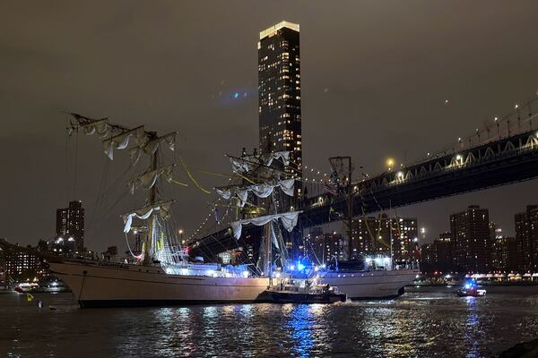 A masted Mexican Navy training ship, the Cuauhtémoc, sits stranded after colliding with the Brooklyn Bridge after, Saturday, May 17, 2025, in New York. (AP Photo/Kyle Viterbo)