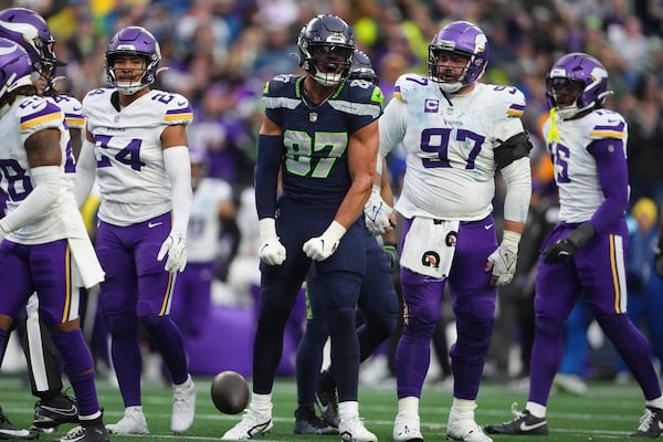 Seattle Seahawks tight end Noah Fant (87) celebrates during the second half of an NFL football game against the Minnesota Vikings, Sunday, Dec. 22, 2024, in Seattle. (AP Photo/Lindsey Wasson)