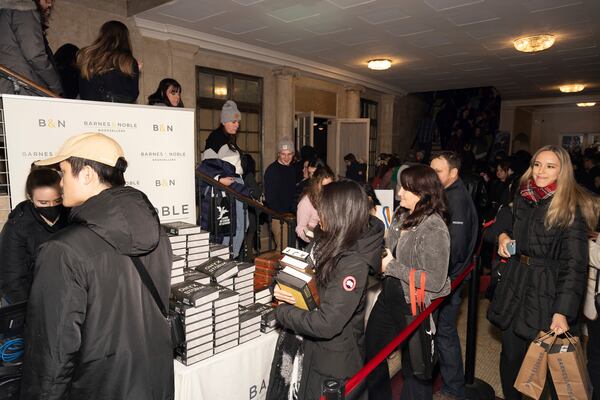 Audience members attend author Rebecca Yarros in conversation of her new book "Onyx Storm" at The Town Hall on Friday, Jan. 24, 2025, in New York. (Photo by CJ Rivera/Invision/AP)