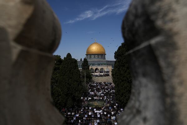 Palestinians perform Friday prayers at the Al-Aqsa Mosque compound in the Old City of Jerusalem, during the holy Muslim month of Ramadan, Friday, March 14, 2025. (AP Photo/Mahmoud Illean)