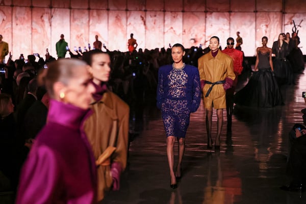 Bella Hadid wears a creation as part of the Saint Laurent Fall/Winter 2025-2026 Womenswear collection presented Tuesday, March 11, 2025. in Paris. (AP Photo/Thomas Padilla)