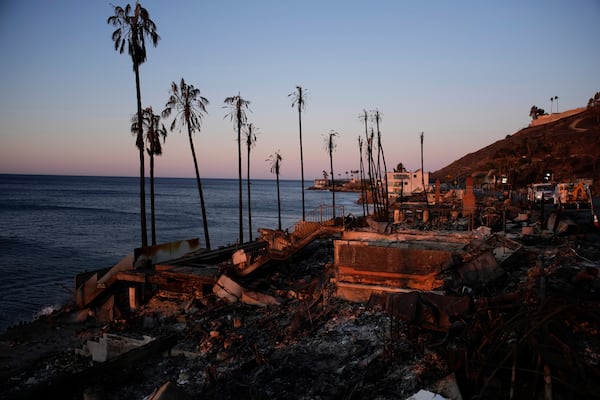 Homes along the Pacific coast are burned to the ground in the aftermath of the Palisades Fire Monday, Jan. 13, 2025 in Malibu, Calif. (AP Photo/John Locher)