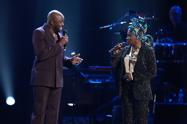 Wayne Brady, left, and Angelique Kidjo perform "Bridge Over Trouble Water" during the 67th annual Grammy Awards on Sunday, Feb. 2, 2025, in Los Angeles. (AP Photo/Chris Pizzello)