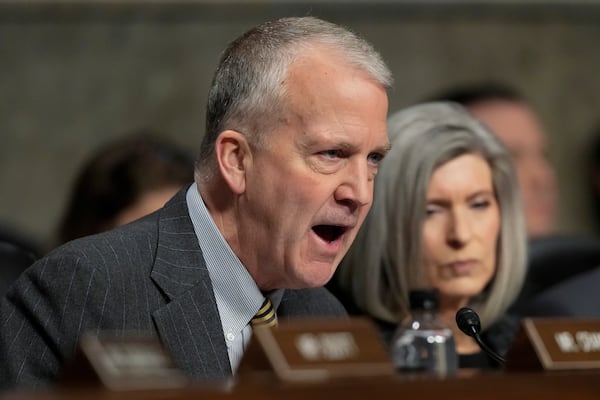 Sen. Dan Sullivan, R-Alaska, speaks during the Senate Armed Services Committee confirmation hearing for Pete Hegseth, President-elect Donald Trump's choice to be Defense secretary, at the Capitol in Washington, Tuesday, Jan. 14, 2025. (AP Photo/Ben Curtis)