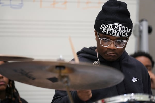 Christian Gillespie plays the drums during rehearsal at the Stax Music Academy, Thursday, Jan. 30, 2025, in Memphis, Tenn. (AP Photo/George Walker IV)