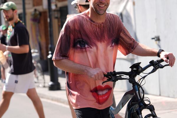 A person wearing a Taylor Swift shirt walks in the French Quarter before the NFL Super Bowl 59 football game between the Kansas City Chiefs and the Philadelphia Eagles, Sunday, Feb. 9, 2025, in New Orleans. (AP Photo/Julia Demaree Nikhinson)