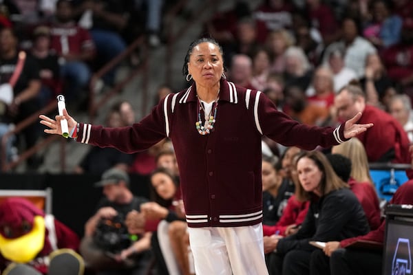 South Carolina head coach Dawn Staley reacts to action on the court during the first half against Indiana in the second round of the NCAA college basketball tournament, Sunday, March 23, 2025, in Columbia, S.C. (AP Photo/David Yeazell)