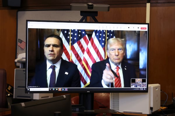 U.S. President-elect Donald Trump appears remotely for a sentencing hearing in front of New York State Judge Juan Merchan in the criminal case in which he was convicted in 2024 on charges involving hush money paid to a porn star, at New York Criminal Court in Manhattan in New York, Jan. 10, 2025. (Brendan McDermid via AP, Pool)