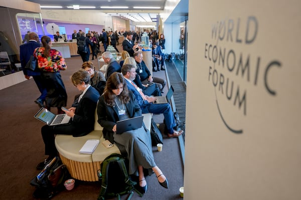 Participants at the Annual Meeting of World Economic Forum in Davos, Switzerland, Wednesday, Jan. 22, 2025. (AP Photo/Markus Schreiber)