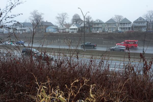 Homes are shown along Interstate 75, Friday, Jan. 31, 2025, in Hamtramck, Mich. (AP Photo/Paul Sancya)