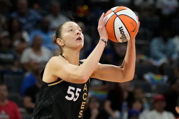 FILE - Las Vegas Aces' Theresa Plaisance (55) plays against the Dallas Wings in an WNBA basketball game Sunday, June 5, 2022, in Las Vegas. (AP Photo/John Locher, File)