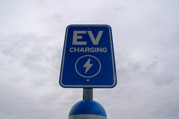 FILE - A sign is displayed at an electric vehicle charging station, March 8, 2024, in London, Ohio. (AP Photo/Joshua A. Bickel, File)