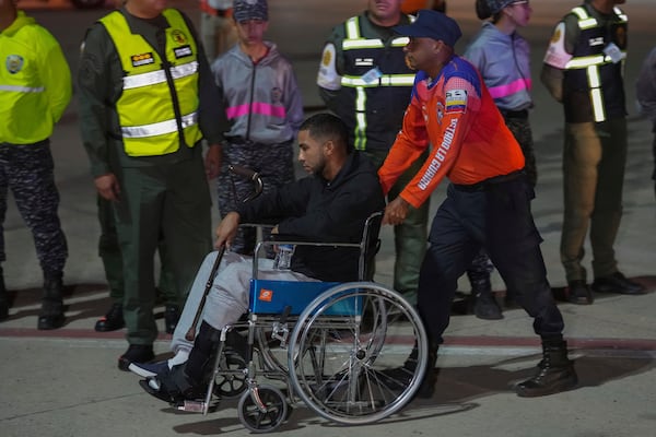 Venezuelan migrants deported from the United States arrive at Simon Bolivar International Airport in Maiquetia, Venezuela, Monday, Feb. 10, 2025. (AP Photo/Ariana Cubillos)