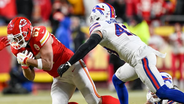 Buffalo Bills linebacker Terrel Bernard (43) pursues Kansas City Chiefs tight end Travis Kelce (87) during the second half of the AFC Championship NFL football game, Sunday, Jan. 26, 2025, in Kansas City, Mo. (AP Photo/Reed Hoffmann)