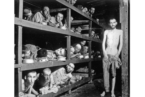 FILE - In this photo provided by the U.S. Army, Naftali Fürst, seen second bunk from top, fifth from left, with other inmates of the German KZ Buchenwald inside their barracks a few days after U.S. troops liberated the concentration camp near Weimar, Germany, on April 16, 1945. (U.S. Army via AP, File)