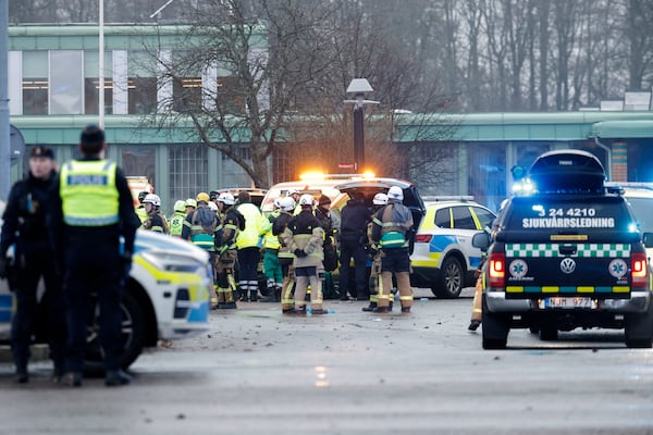 Emergency services at the scene of an incident at Risbergska School, in Örebro, Sweden, Tuesday, Feb. 4, 2025. (Kicki Nilsson/TT News Agency via AP)