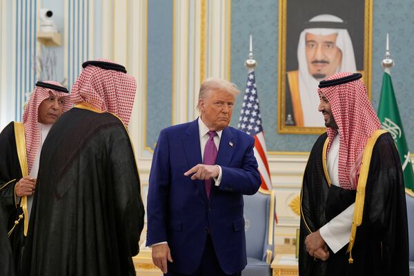 President Donald Trump and Saudi Crown Prince Mohammed bin Salman speaks as they meet delegations during an arrival ceremony at the Royal Palace in Riyadh, Saudi Arabia, Tuesday, May 13, 2025. (AP Photo/Alex Brandon)