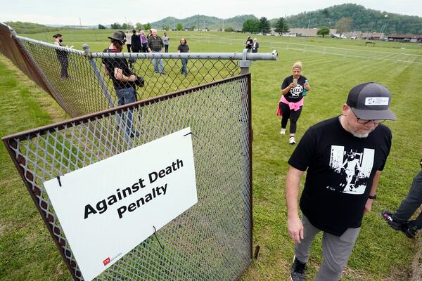 FILE - People leave the demonstration area set up for capital punishment protesters after an announcement was made that the scheduled execution of inmate Oscar Smith has been delayed, April 21, 2022, in Nashville, Tenn. (AP Photo/Mark Humphrey, File)
