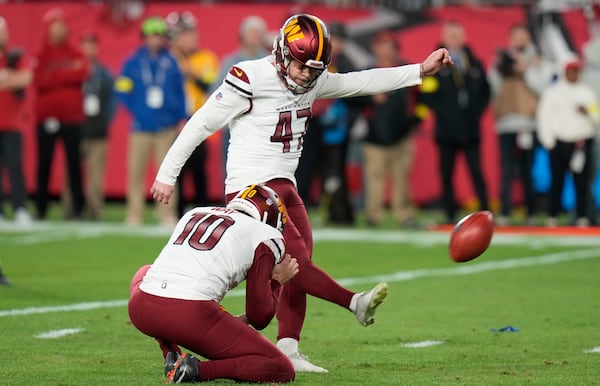 FILE - Washington Commanders' Zane Gonzalez (47) kicks a field goal against the Tampa Bay Buccaneers during an NFL wild-card playoff football game, Jan. 12, 2025, in Tampa, Fla. (AP Photo/Chris O'Meara, File)