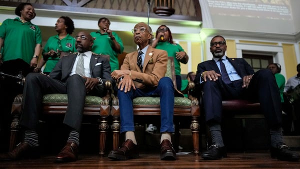 From left; U.S. Sen. Raphael Warnock, Rev. Al Sharpton and NAACP President Derick Johnson participate in a church service at the Tabernacle Baptist Church during the 60th anniversary of the march to ensure that African Americans could exercise their constitutional right to vote, Sunday, March 9, 2025, in Selma, Ala. (AP Photo/Mike Stewart)