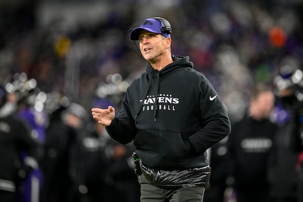 Baltimore Ravens head coach John Harbaugh talks to an official during the second half of an NFL football game against the Pittsburgh Steelers, Saturday, Dec. 21, 2024, in Baltimore. (AP Photo/Nick Wass)