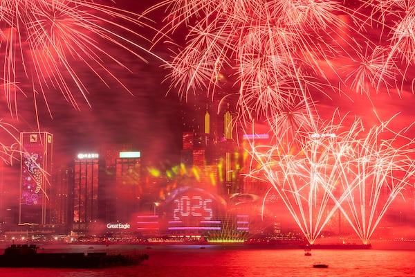 Fireworks explode over Victoria Harbour to celebrate the start of 2025 at Tsim Sha Tsui in Hong Kong, Wednesday, Jan. 1, 2025. (AP Photo/Chan Long Hei)