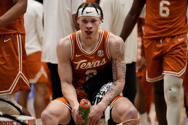 Texas guard Chendall Weaver (2) watches play against the Tennessee during the second half of an NCAA college basketball game in the quarterfinal round of the Southeastern Conference tournament, Friday, March 14, 2025, in Nashville, Tenn. (AP Photo/George Walker IV)