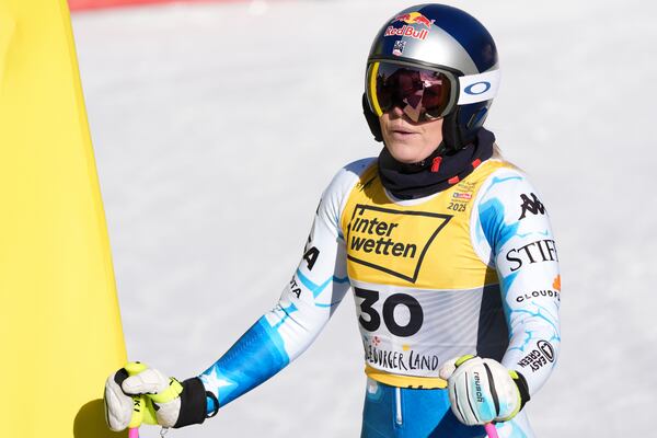 United States' Lindsey Vonn reacts after completing an alpine ski, women's World Championship downhill training, in Saalbach-Hinterglemm, Austria, Tuesday, Feb. 4, 2025. (AP Photo/Giovanni Auletta)