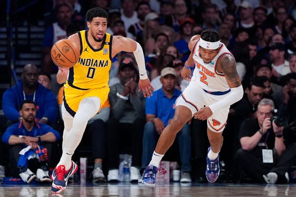 FILE - Indiana Pacers guard Tyrese Haliburton (0) dribbles during the first half of Game 7 in an NBA basketball second-round playoff series against the New York Knicks, May 19, 2024, in New York. (AP Photo/Julia Nikhinson, File)